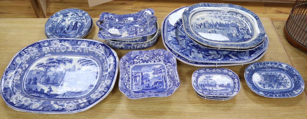 A collection of 19th / 20th century blue and white pottery including meat platters, dishes, bowls, etc.